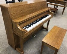 Yamaha P22 studio piano in oak