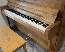 Young Chang studio piano in oak