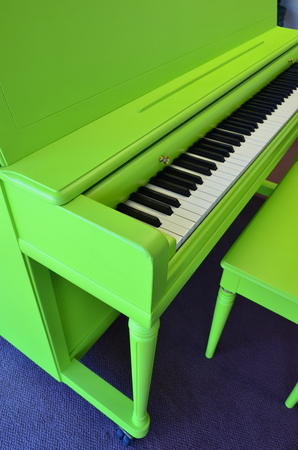 green grand piano